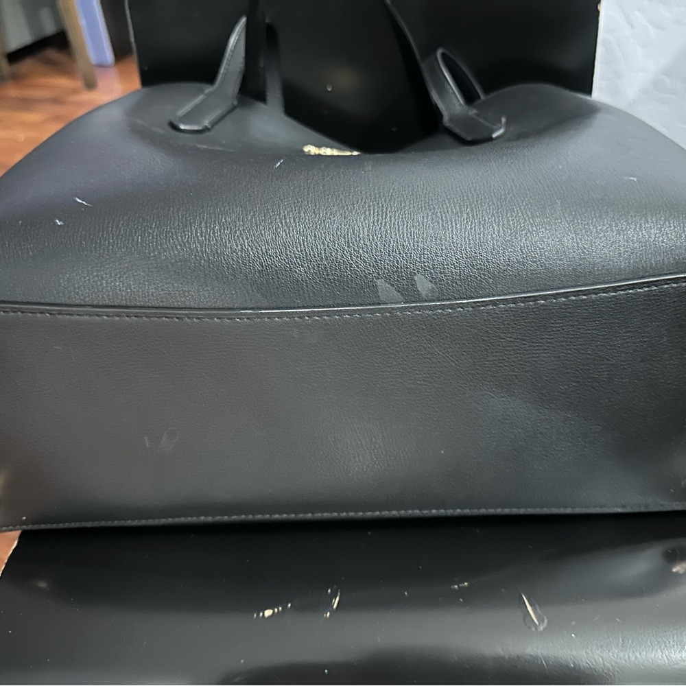 Pre-owned large Coach purse.